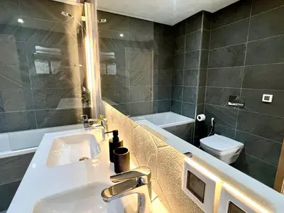 a bathroom with a sink and a toilet at Luxury Apartment with a Stunning Sea View - Rabat in Rabat