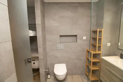 a bathroom with a toilet and a sink at B5 Modern bright studio with city view in Casablanca