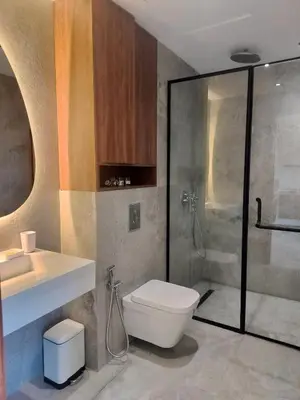 a bathroom with a shower and a toilet and a sink at Luxury Stay in Casablanca in Maarif