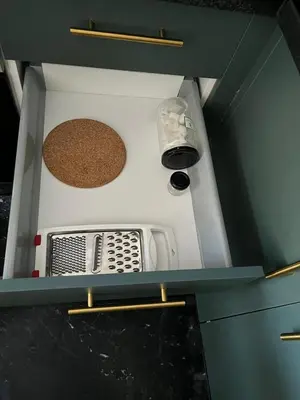 a kitchen with a stove top oven in a kitchen at Studio Les princesses in Maarif