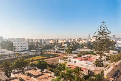 a cityscape of a city with buildings and trees at Urban Escape Designer Apartment with Balcony in Casablanca