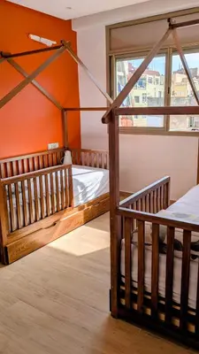 two bunk beds in a room with a window at appartement en bord de mer Rabat in Rabat