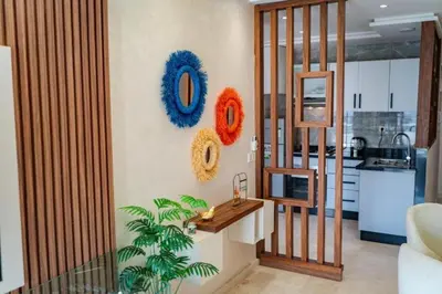 a living room with some wreaths on the wall at Studio in Casablanca