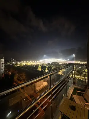 a view of a stadium at night at Hay Riad Sunset Studio Stadium View , 5 mind a pied stade moulay abdelah in Rabat