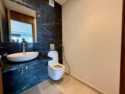 a bathroom with a sink and a toilet at Beau studio a CFC in Casablanca