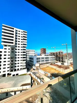 a view of a city from a window at Luxury Studio in a secured residence in Aïn Harrouda