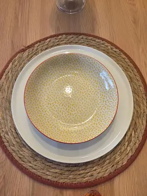 a plate sitting on top of a table at Casablanca METROPOL Suites in Casablanca