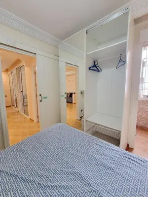 a bedroom with a bed in a room at 7 min to beach luxury apartment Dar Bouazza in Casablanca