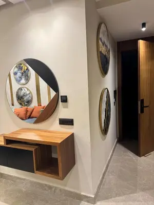 a room with a circular mirror on the wall at SALVia Loft - Sweetness and Cozy Apartment with Terrace Near Mohammed V Stadium in Casablanca