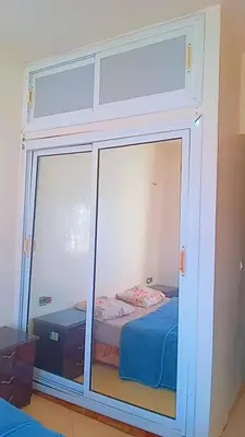 a bedroom with a window with a bed in it at Tranquilité au rendez-vous in Casablanca