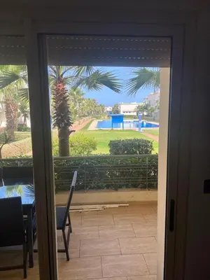 a door to a patio with a view of a yard at seaside entire villa with pool view in Casablanca