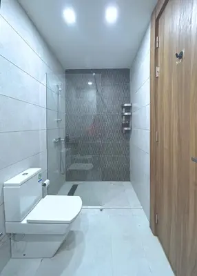 a bathroom with a shower and a toilet and a shower at Premium Studio Central Casablanca in Casablanca