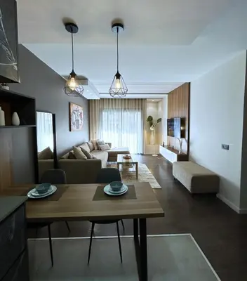 a living room with a couch and a table at Premium Studio Central Casablanca in Casablanca