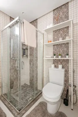 a bathroom with a shower and a toilet at La perle de Harhoura Piscine-Océan -Terrain Rabat in Temara