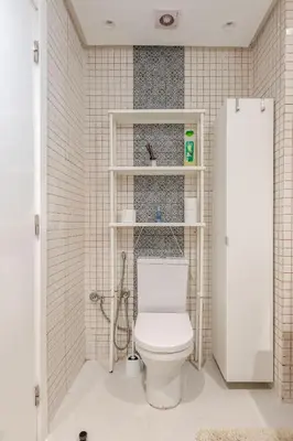 a bathroom with a white toilet in a room at La perle de Harhoura Piscine-Océan -Terrain Rabat in Temara