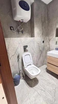 a bathroom with a toilet and a sink at Hammersmith 11 in Casablanca