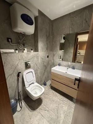 a bathroom with a toilet and a sink at Studio à louer in Casablanca