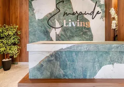 a lobby with a sign that reads miracle living at Studio Luxe avec vue Magnifique WiFi Haut Debit et Netflix Inclus in Casablanca