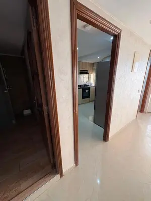 a hallway with an open door to a kitchen at VILLA Dar BOUAZZA, Vue sur mer, 200m de la plage in Dar Bouazza