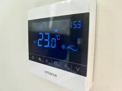 an alarm clock hanging on a wall at Maya Suites - Seaside Luxury Apartment in Casablanca