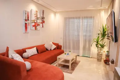 a living room with a couch and a table at R109- Outstanding 1 BR Aprt with Great View in Casablanca