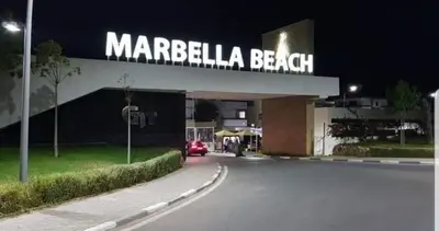 a margela beach sign on the side of a building at well-equipped apartment in Mansouria