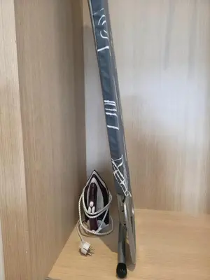 a baseball bat and glove sitting on a shelf at super studio in Aïn Harrouda
