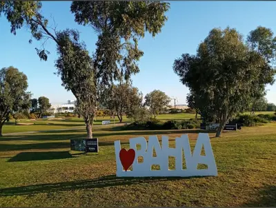 a sign that says pain in a park at Seaside Luxury 3BR With Pool & Private Beach Access in Bouznika