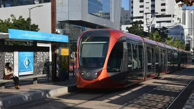a red train is stopped at a train station at Cozy & Bright, Free Parking, Tram in Casablanca
