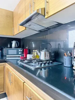 a kitchen with a stove with a pot on it at Appartement Typique Marocain in Oulad Akkou