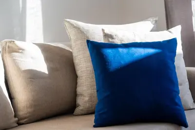 a group of pillows sitting on a couch at C14- 1BR Luxury Apartment -Terrace Majorelle in Casablanca