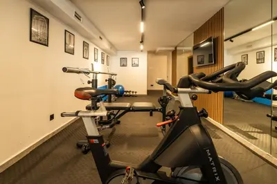a gym with two exercise bikes in a room at C13 - 1BR Suite - Private Gym - Terrace - Rooftop in Maarif