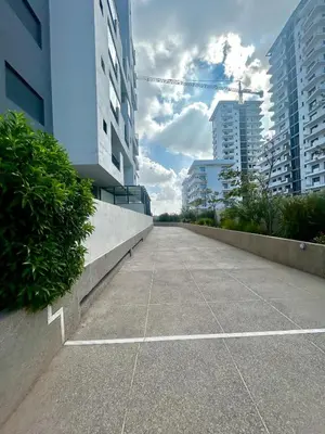 an empty street in a city with tall buildings at Chic Cocoon & Impeccable Sea View in Zenata in Aïn Harrouda