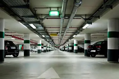 an empty parking garage with cars parked in it at Oasis de Sérénité avec Piscine in Casablanca