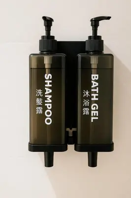 two black bottles of water are next to each other at Cozy 2-bedroom studio in Casablanca