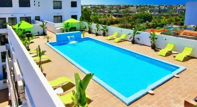 a large swimming pool on the roof of a building at Cozy 2-bedroom studio in Casablanca