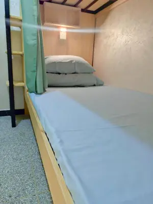 a bed in a room with a bunk bed at \u9526\u9ca4JinLi Voyageur in Casablanca