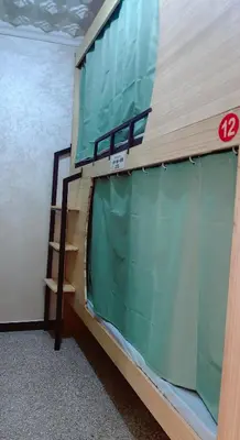 a room with a bunk bed with a window at \u9526\u9ca4JinLi Voyageur in Casablanca