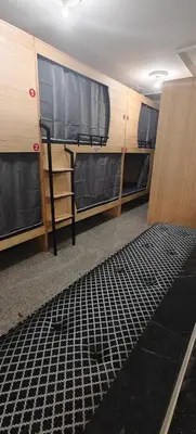 an empty room with two bunk beds and a carpet at \u9526\u9ca4JinLi Voyageur in Casablanca
