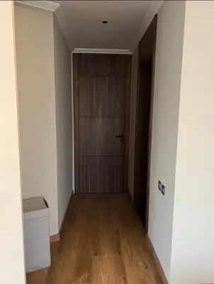 an empty hallway with a door in a room at Beautiful 2 suites apartment modern cozy and central in Casablanca