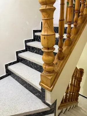 a set of stairs with black and white at family apartment in rabat in Rabat