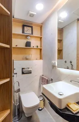 a bathroom with a white sink and a toilet at Large Comfort Duplex Casablanca Center in LʼOasis