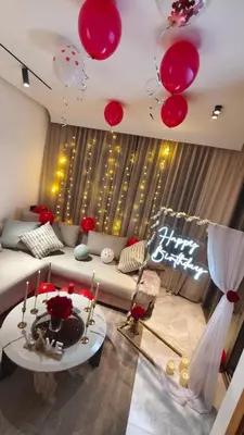 a living room with red balloons hanging from the ceiling at Studio luxueux CFC in Casablanca