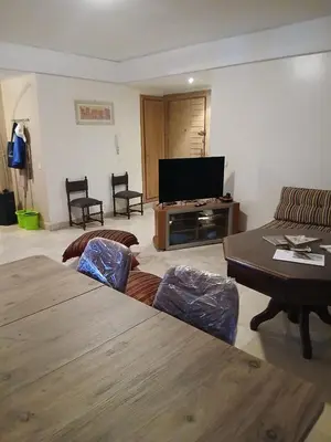 a living room with a couch and a table at BK anfa in Casablanca