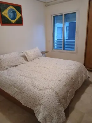 a bedroom with a bed and a window at BK anfa in Casablanca