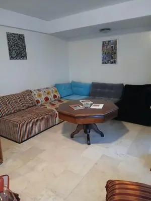 a living room with a couch and a coffee table at BK anfa in Casablanca