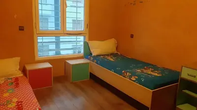 a small room with a bed and a window at Appartement meublé à Casablanca in Casablanca