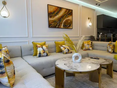 a living room with a couch and a table at Premium Business Suite Heart of Casablanca in Casablanca