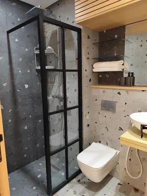 a bathroom with a toilet and a sink at EDEN Palmier in Casablanca