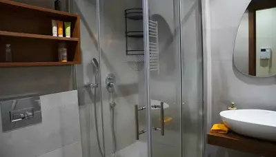 a bathroom with a shower and a sink at Maya Suites - Premium Stay - Racine in Casablanca